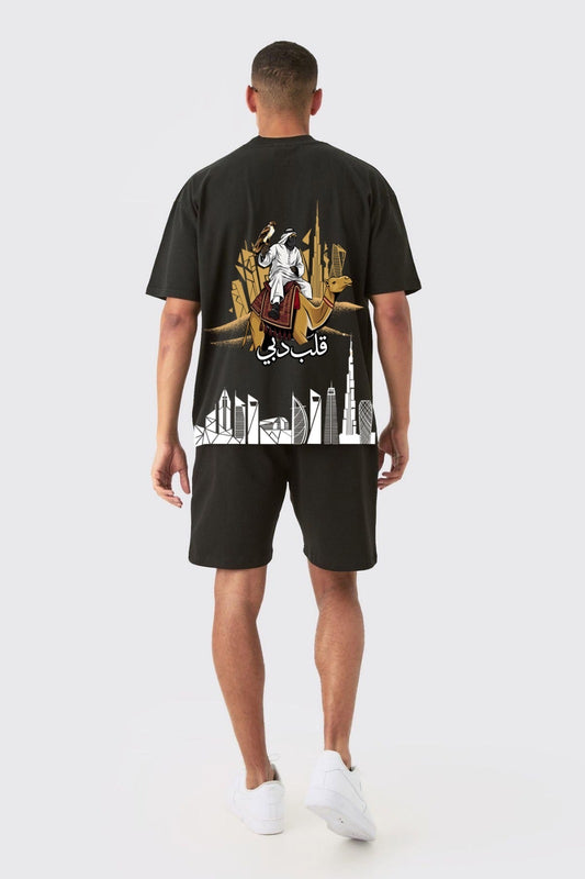 Back of the black Dubai's Heart oversized tee with a falconer on a camel and the Dubai skyline