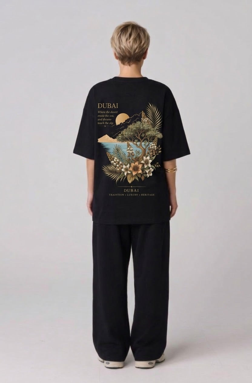 Back of the black Dubai Oasis oversized tee with the Dubai desert and sea oasis print