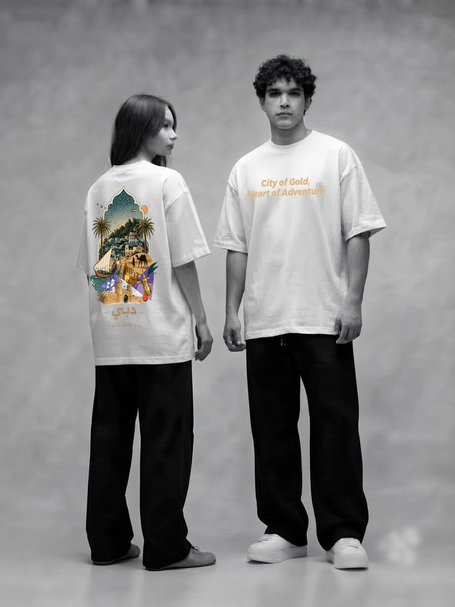 Couple wearing white City of Gold Heritage oversized tees, front and back prints